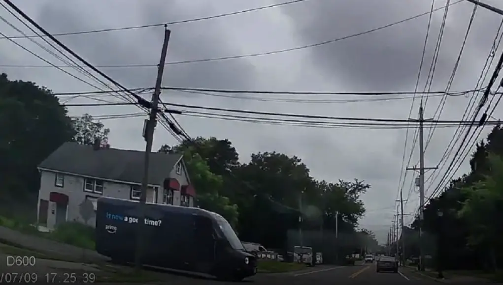 Amazon Van driver and left turner pull out in front of dashcam owner way too close for comfort.