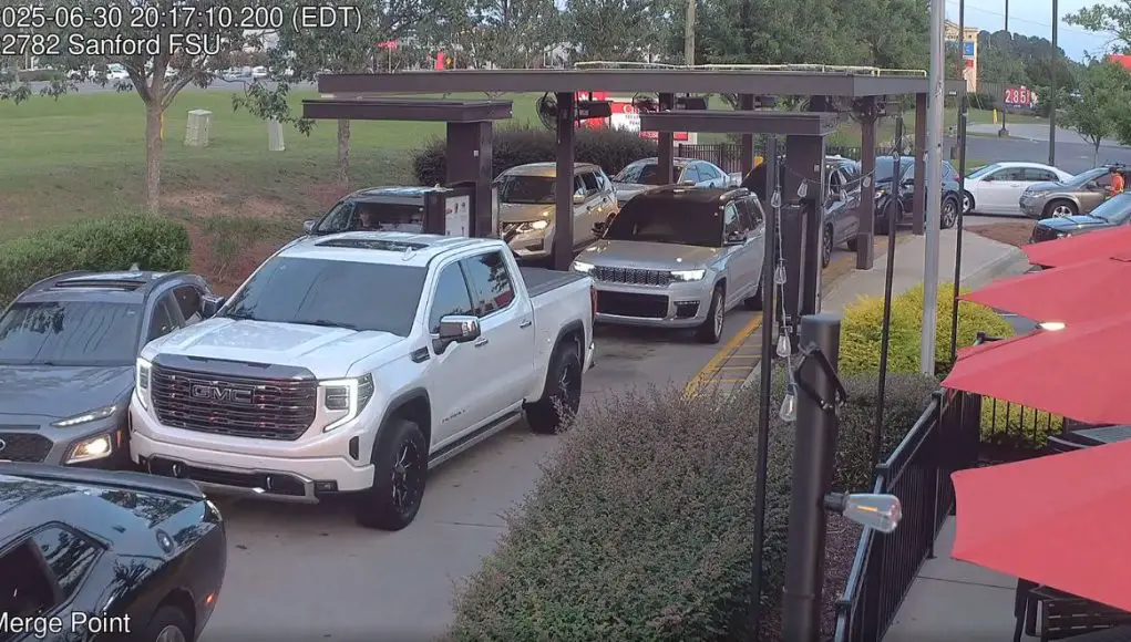 Idiot in Chik-fil-A drive thru tries to cut line but crashes instead