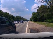 Idiot driver changing lanes on Meadowbrook State Parkway forces dashcam owner off the road.