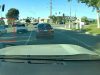 Idiot on Pullman St. headed towards Dyer heads the wrong way into traffic. Thinks opposing lane is left turn lane.