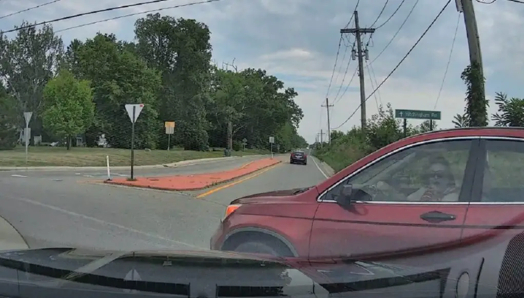 Idiot at Hitchingham and Textile roundabout enters without yielding. Almost crashes into dashcam owner.