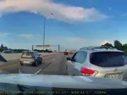 Driver on 410 exit makes unsafe lane change between two vehicles, almost causing a multi-vehicle collision.