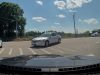 Distracted driver turns into a wrong way turner onto River St.