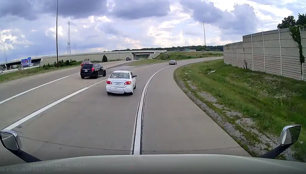 Careless, air brained driver comes to a stop on this I-74 on-rap in front of a 74,000 load carrying semi truck.