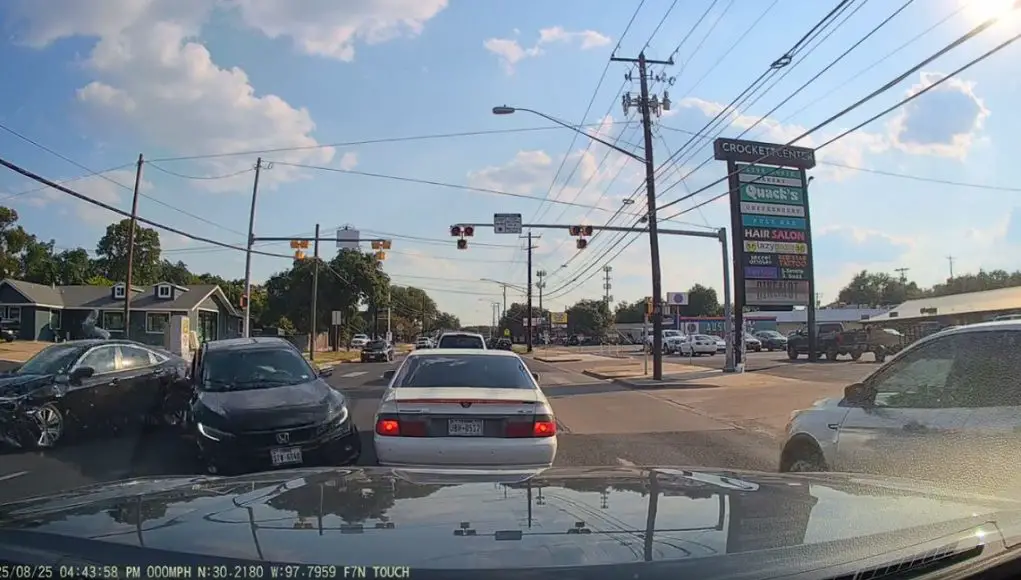 Driver exiting Crockett Center onto Menchaca fails to yield to cross traffic. T-boned causing multi-vehicle crash.