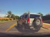 Hummer driver on 12th st. bolts ou tinto traffic, cutting off dash cam owner and almost causing a collision.