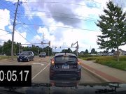 Distracted driver on S Main St. and Highway 40 throws brake check tantrum, runs red light, after being called out.