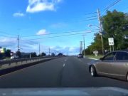 Idiot in BMW jumps out onto Route 9 without yielding to 50 MPH cross traffic. Almost collidse with dashcam owner.