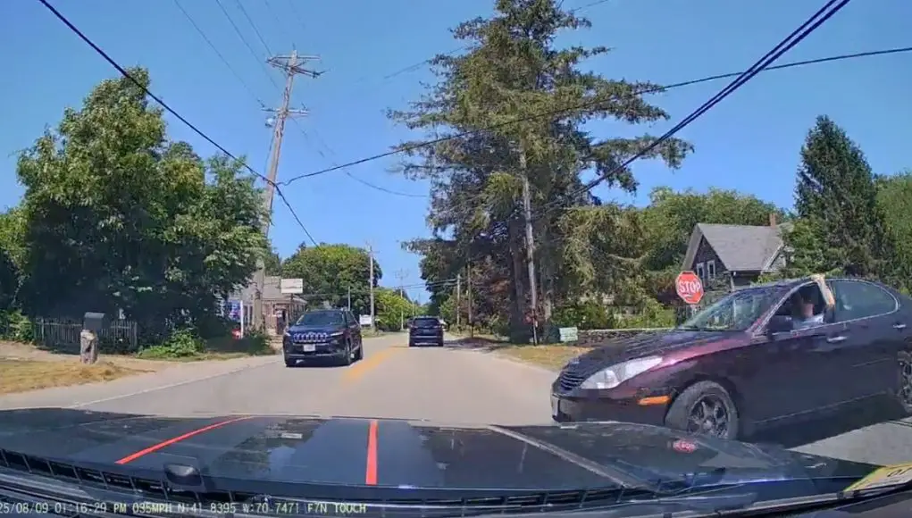 Ignorant driver in Carver, Mass fails to yield at stop sign at t-intersection, nearly t-bones dashcammer.