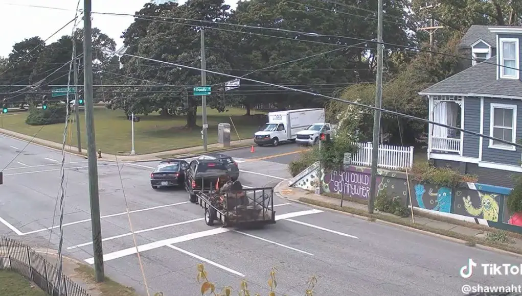 Idiot on Friendly and Medenhall decides to turn right from far left causing their own t-bone and multi-car pileup.