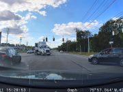 Worst driver ever makes left turn across multiple lanes of traffic from the emergency breakdown lane on Vestel Parkway