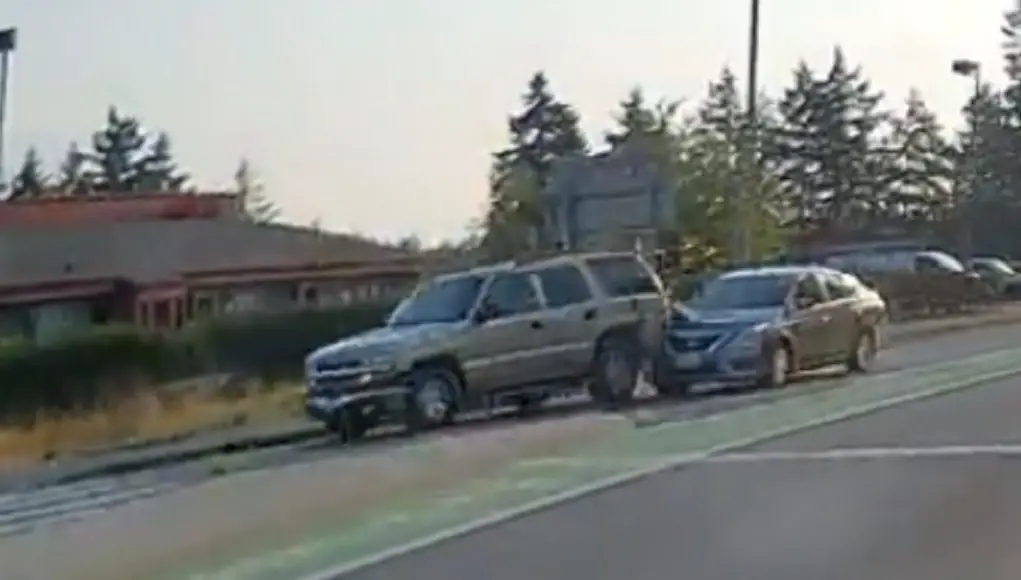 Negligent driver slams into rear of Suburban on Kitsap Way. Lies to a cop about what happened without knowing there's dashcam footage.