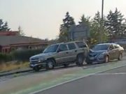 Negligent driver slams into rear of Suburban on Kitsap Way. Lies to a cop about what happened without knowing there's dashcam footage.