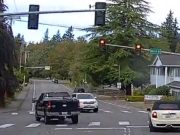 F-150 driver on Birch and Lakeway throws tantrum after car in front of them doesn't beat red. Runs red against opposing traffic in response.