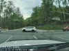 Driver exiting Gatlinburg Welcome Center pulls out into US-441 intersection at the worst possible time. Almost causes her own T-bone accident.