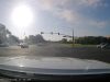 Driver on Jamboree and Irvine assumes they've got the green despite not being able to see the turn signal. Almost collide with dashcam owner with green light.