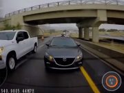 Mazda driver refuses to let truck zipper merge in front of them on the 67 almost causing a side collision.