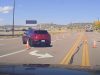 Elderly lady driver gets confused by cones rerouting traffic on Front St. Drives into oncoming traffic as a result.