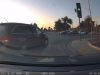 Reckless Honda van driver makes insane right turn across two right lanes from a through lane.