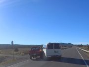 Misinformed driver overtakes in front of signaling drivers on UT-12. Crashes into them instead.