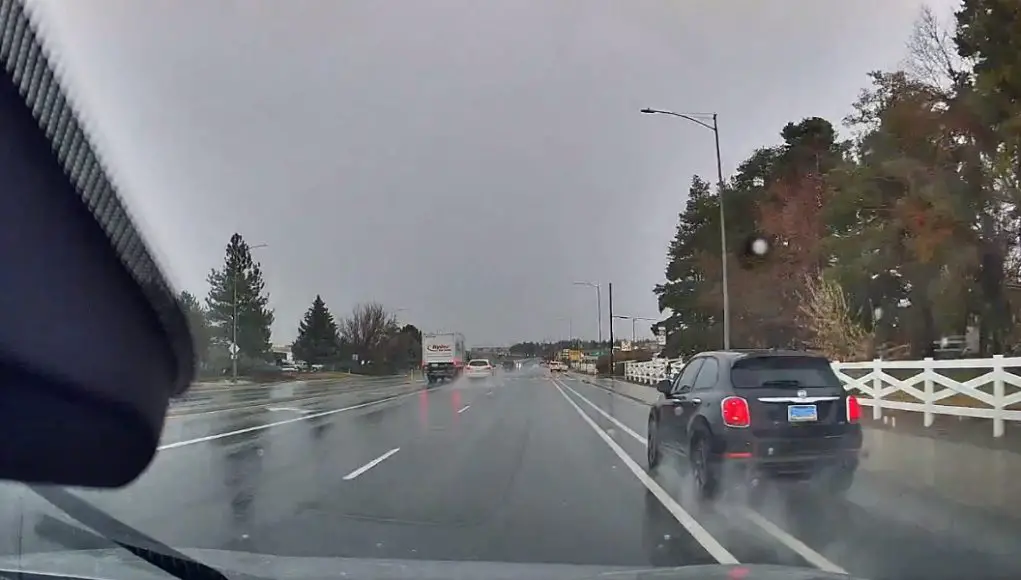 using bike lane to overtake Stead Blvd Crazy Fiat driver uses bike lane on rain-soaked Stead Blvd to overtake dashcam owner.