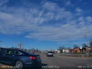 Driver in Impala does illegal left turn. Has the nerve to throw an obscene gesture twice in retaliation.