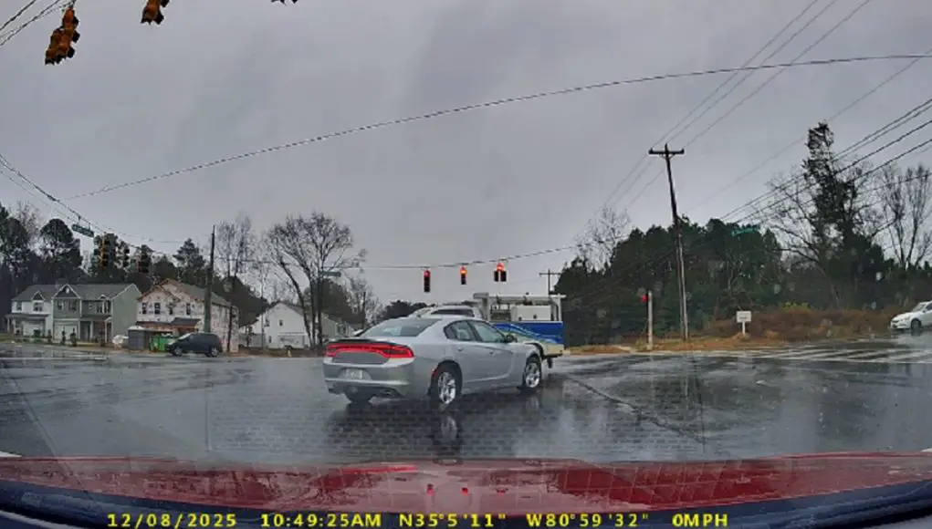 Charlotte, N.C.: Impatient Driver Runs Red at Hamilton & Steele Creek, Creeps Through Intersection, Then Stops at the Red Light Red light runner in Charlotte at Steele Creek and Hamilton creeps through red only to stop at the next intersection like they weren't in a rush.