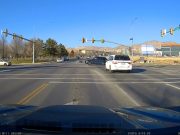 Extremely late red light runner at Ashton and Triumph narrowly avoids one nasty t-bone collision by mere inches.