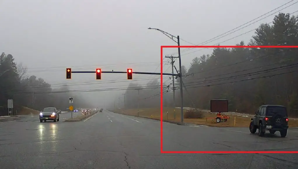 Impatient Jeep driver at Camp Sargent and Industrial thinks he's avoiding the red light when, in reality, he's just breaking the law.