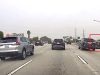 Driver on the 405 pulls insane move 100 feet before Carson St. exit almost causing massive pileup.