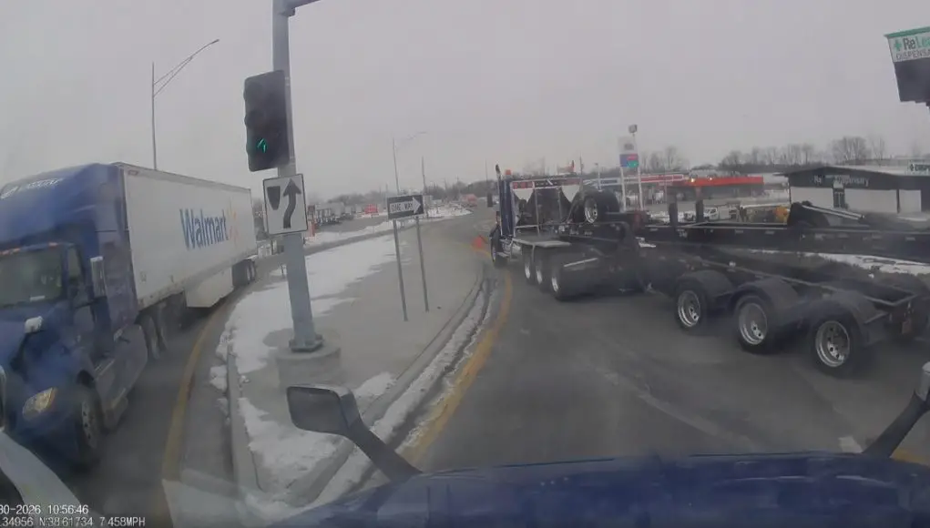 Harrisonville, MO: Who’s In The Wrong? Semi Hauling Oversized Load Exiting Highway 7 Fails To Yield To E 275th St Traffic With Right-Of-Way Semi hauling multi-axle trailer with oversized load caught on dashcam blowing through yield sign on Highway 7 off-ramp.