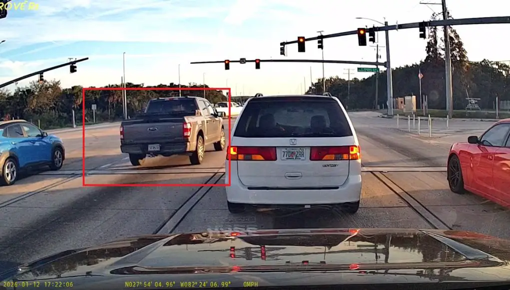 Ford F-150 driver at FL-45 and Madison Ave & Pendola Point can't be bothered with red light. Straight up runs it, no yielding needed.