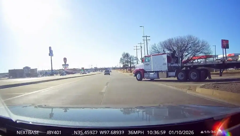 Yukon, OK: Trucker Merging From I-40 Blows Past Yield on Morgan, Nearly Wipes Out Dashcam Owner With Right-of-Way 18-wheeler merging onto Morgan Rd. from I-40 blows past yield sign, almost side swipes dashcam owner with right-of-way.