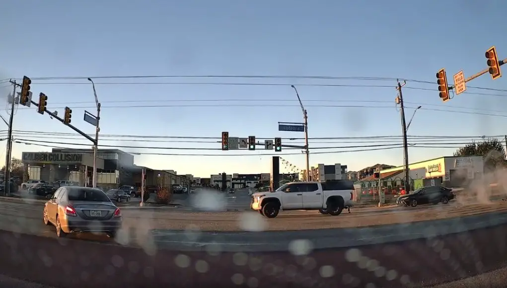 Distracted driver at busy Culebra intersection slams into back of pickup at nearly full speed.