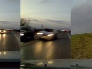 Driver not paying attention swerves into dashcam owner's lane causing them to lose control and end up backwards in a ditch.