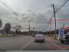Driver exiting Exxon tries to brute force his way onto Columbia Pike without yielding. Stopped by dashcam owner insisting on their right-of-way.