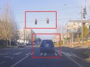 Impatient driver at Greenwood and N 90th can't be bothered to wait for a red light, runs it after 10 seconds.