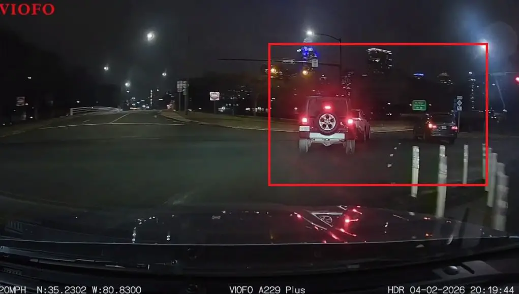 Minivan's last second improper lane change from Caldwell to E 12th onto I-277 on-ramp triggers hit-and-run collision.