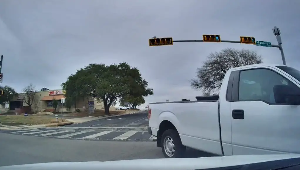 Ignorant driver fails to yield turning left onto Rundberg. Almost causes their own T-bone collision.