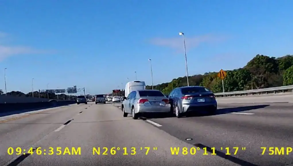 Pompano Beach, FL: Driver Not Paying Attention Going Southbound On The Turnpike Swerves, Loses Control & Slams Into Side Of Toyota Corolla Distracted driver on the Florida Turnpike avoids rear ending car but loses control and slams into the side of them, instead.