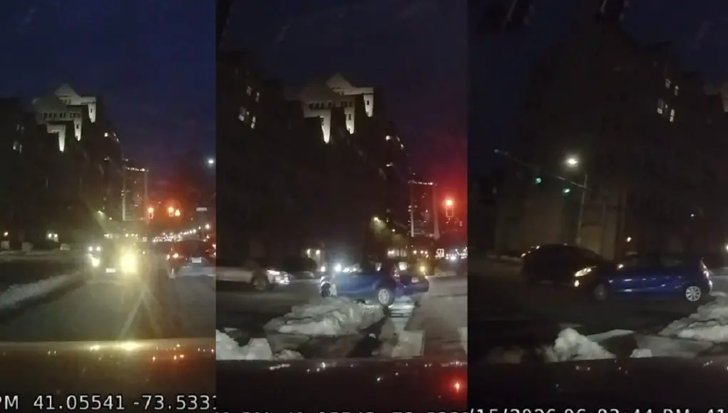 Careless driver turning from Grove head into the wrong lane then immediately busts a u-turn against a red light.