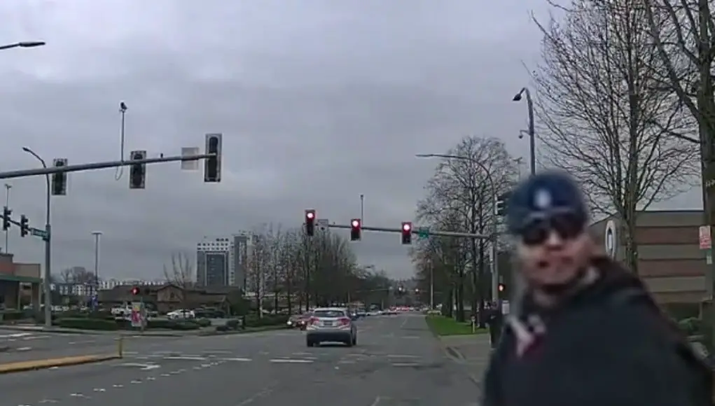 Tukwila, WA: Clueless Driver on Strander Near Westfield Southcenter Blows Red Light Leaving Pedestrian Shaking Their Head Red light runner on Strander near Westfield Southcenter blows through intersection, leaves pedestrian shaking their head.