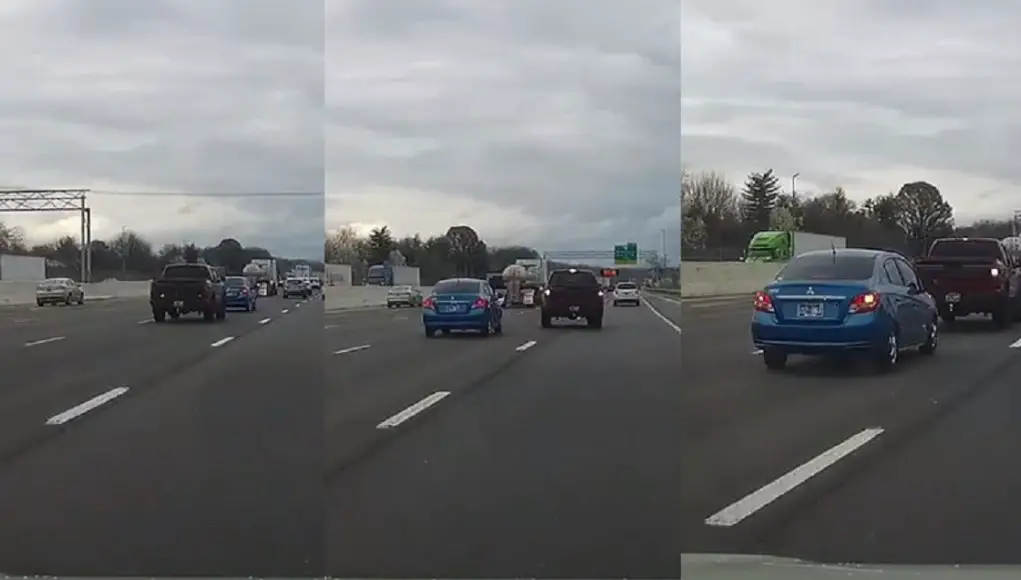 Pickup driver on I-75 forced to slot behind tiny Mitsubishi resorts to brake check road rage revenge.