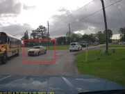 Careless driver doesn't look, blindly turns onto Biscayne Blvd, narrowly avoids hitting bright yellow, Volusia District School Bus.