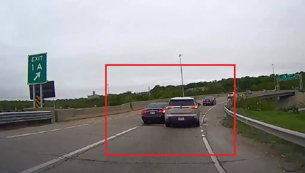 Ignorant driver tries to brute force lane change towards right exit on I-635 off-ramp, causes sideswipe accident instead.
