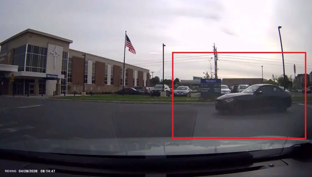 Ignorant driver navigating St. Luke's Parking Lot off of Cetronia blows past stop sign, nearly t-boning dashcam owner.