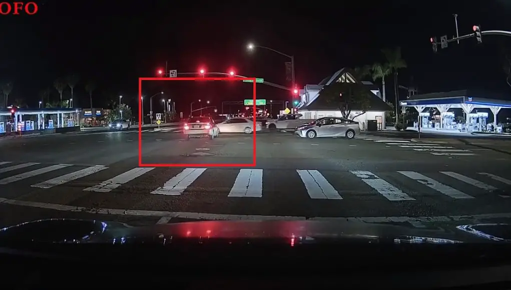 Distracted and impatient driver runs red at Palomar Airport and Paseo Del Norte. Nearly t-bones traffic with right-of-way.
