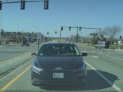 Driver slotting into a left turn lane on Maine Mall Rd decides, for some reason, to go straight, towards a dashcammer, instead.