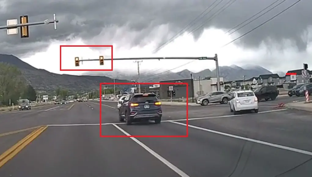 Driver with the worst habits, fully intending to beat red at State and N 1650 W, forced to brake to avoid t-bone.