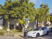 An e-bike rider across from Saburo Muraoka Elementary, although riding where they weren't supposed, was hit by a Tesla driver not paying attention.